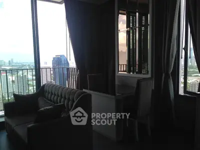 Luxurious high-rise apartment with stunning city view and elegant interior design.