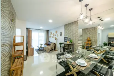 Modern open-plan living and dining area with stylish decor and ample natural light.