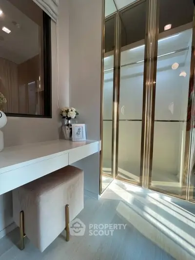 Elegant study nook with mirrored closet doors and chic decor