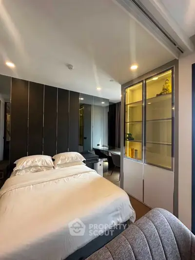 Modern bedroom with sleek design and built-in storage
