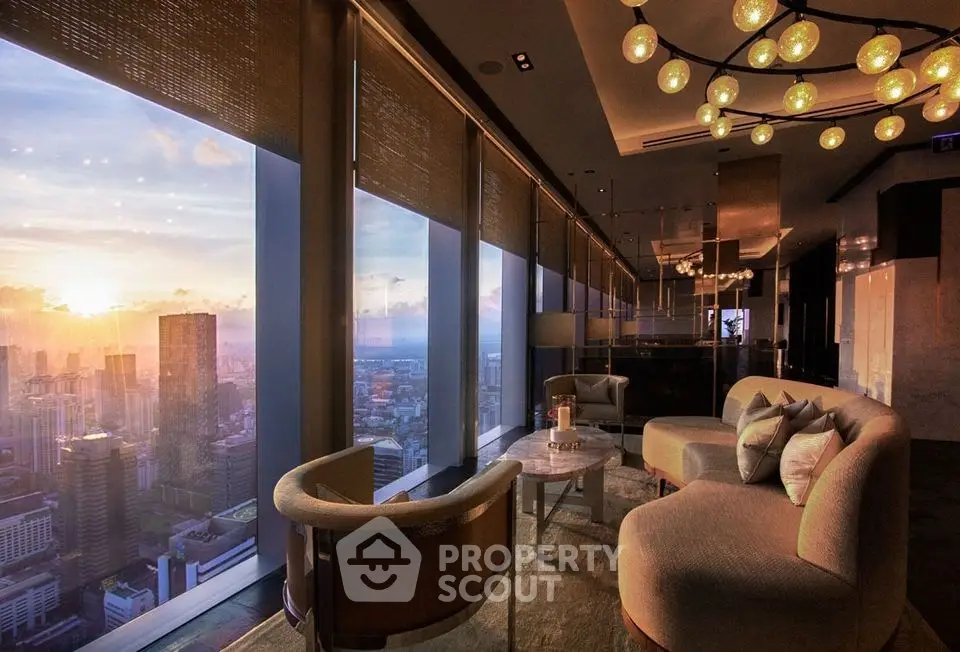 Luxurious high-rise living room with stunning cityscape view at sunset, featuring modern furniture and elegant lighting.