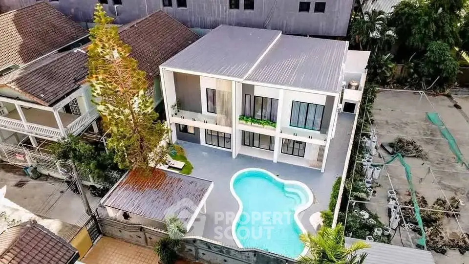 Luxurious modern villa with private pool and spacious balcony, perfect for upscale living.