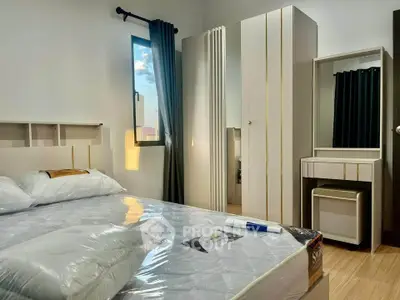 Modern bedroom with stylish furniture and natural light