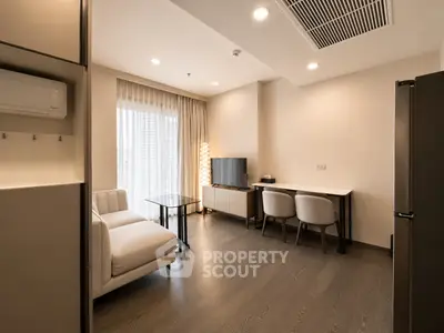Modern living room with elegant furniture and natural light, perfect for urban living.