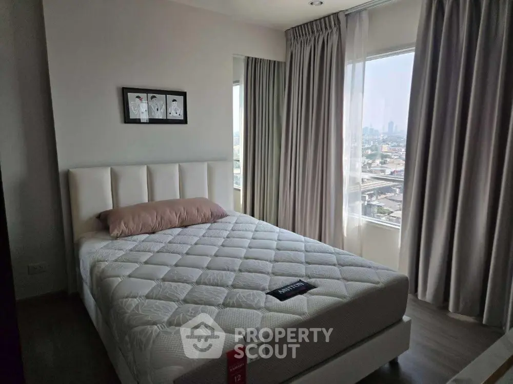 Modern bedroom with city view and stylish decor