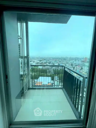 Stunning high-rise balcony with panoramic city views, perfect for urban living enthusiasts.
