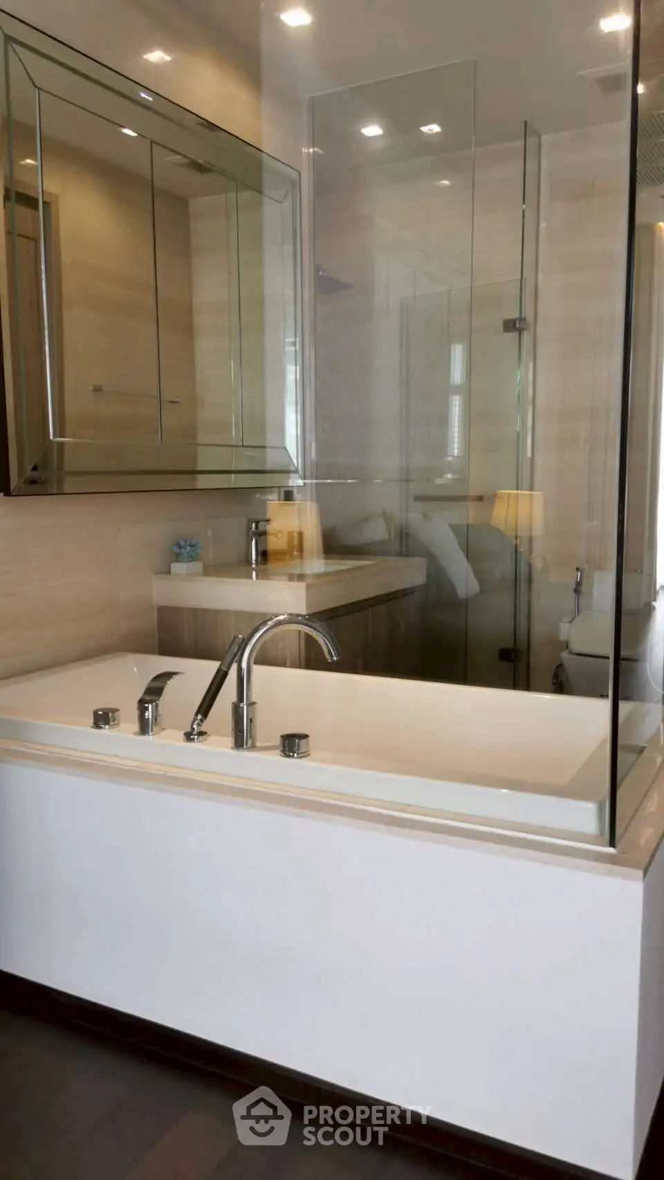 Luxurious bathroom with modern bathtub and glass shower enclosure