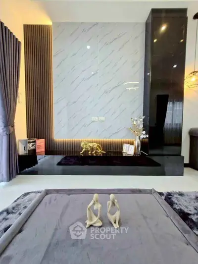 Modern living room with stylish decor and elegant lighting