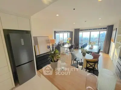 Spacious modern living room with city view and stylish decor