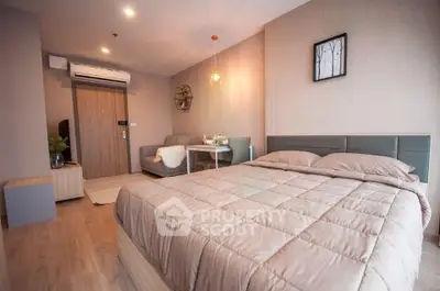 Modern bedroom with cozy decor and stylish furnishings in a contemporary apartment.