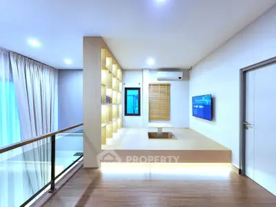 Modern minimalist living room with built-in shelving and sleek design