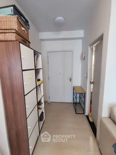 Cozy hallway with storage cabinets and modern decor