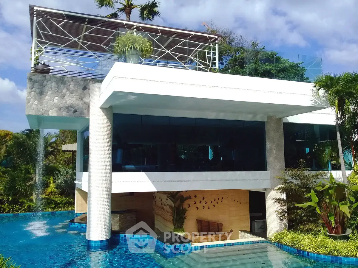 Luxurious modern villa with stunning pool and lush garden surroundings