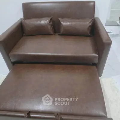Luxurious brown leather sofa set in modern living room