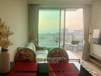 Luxurious living room with stunning balcony view and elegant decor