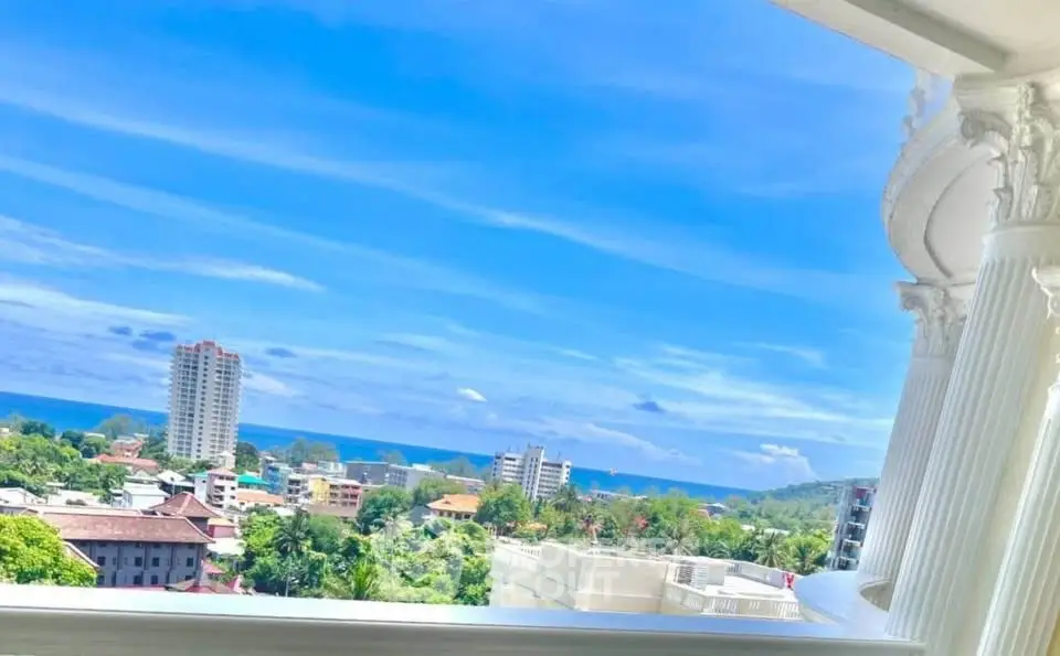 Stunning ocean view from a luxurious balcony with elegant architectural details.