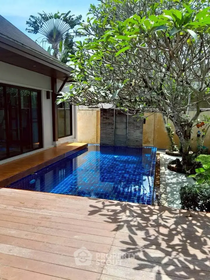 Luxurious villa with private pool and lush garden, perfect for relaxation and entertaining.