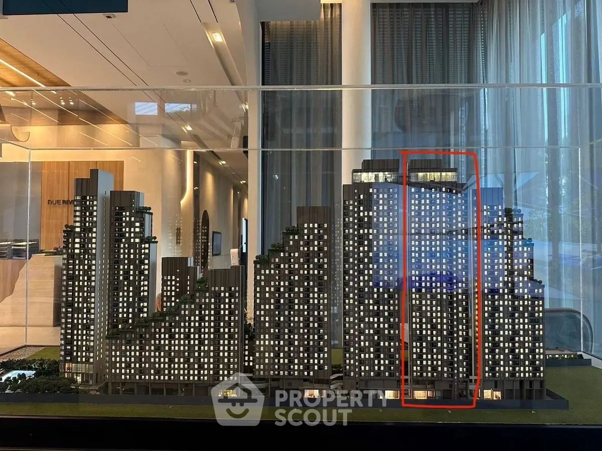 Modern architectural model of high-rise residential buildings with sleek design and urban appeal.