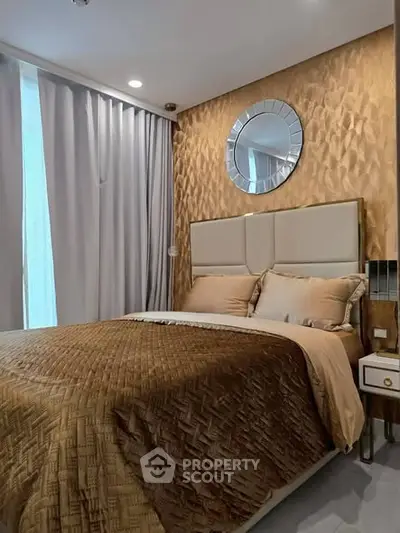 Luxurious bedroom with elegant decor and plush bedding in modern apartment