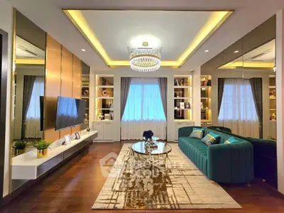 Luxurious living room with elegant chandelier and modern decor