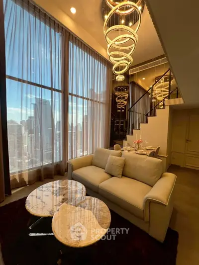 Luxurious high-rise living room with stunning city view and elegant lighting.