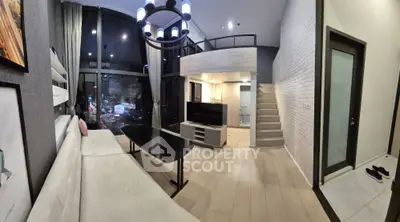 Luxurious modern living room with high ceilings and mezzanine in city apartment