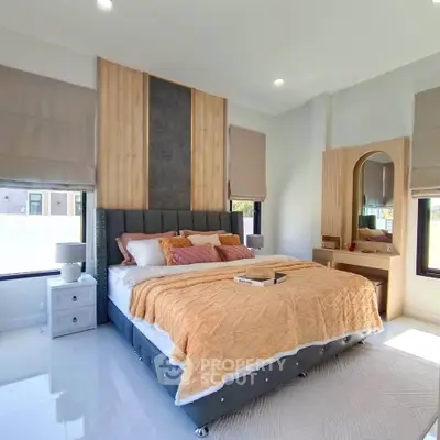 Luxurious bedroom with elegant decor and natural light