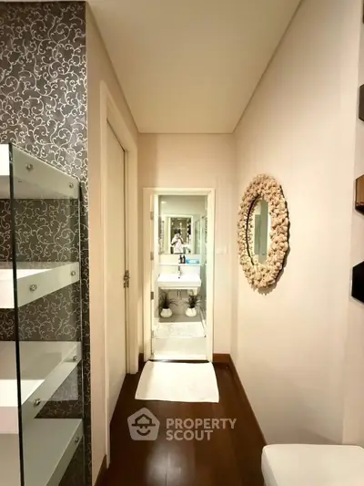 Stylish bathroom with elegant decor and modern fixtures in a luxurious apartment.