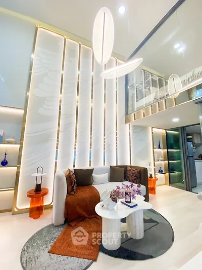 Luxurious modern living room with high ceilings and elegant lighting