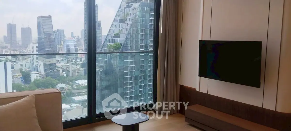 Modern living room with stunning city view and sleek interior design.
