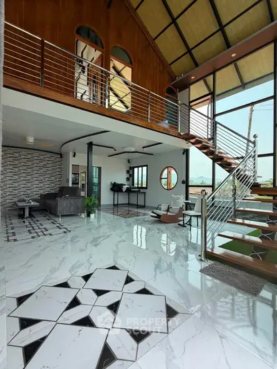 Stunning modern living room with high ceilings and elegant staircase in luxury home