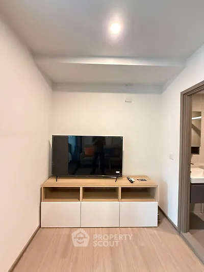 Modern living room with sleek TV setup and minimalist decor