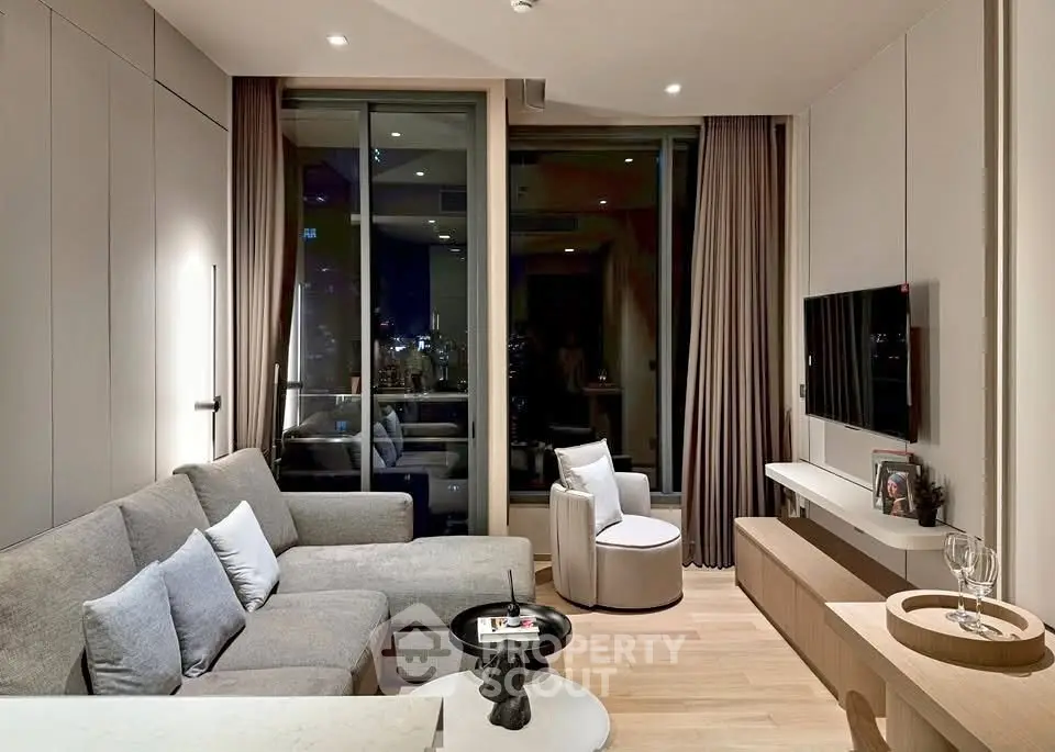 Modern living room with sleek furniture and city view, perfect for urban living.