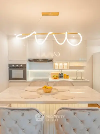 Modern kitchen with elegant lighting and sleek design