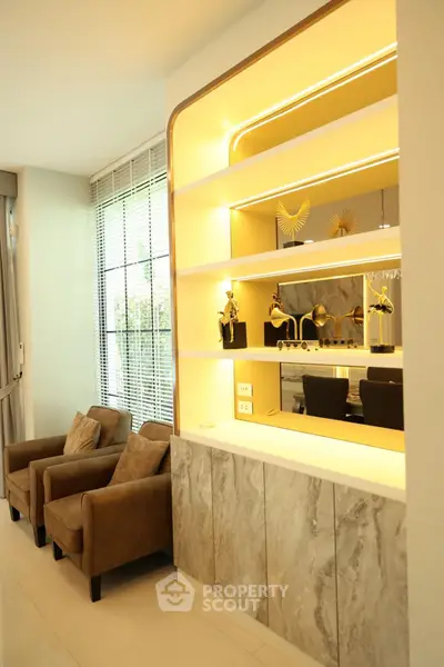 Luxurious modern living room with elegant decor and stylish lighting