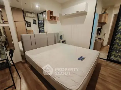 Modern bedroom with stylish decor and spacious layout in a contemporary apartment.