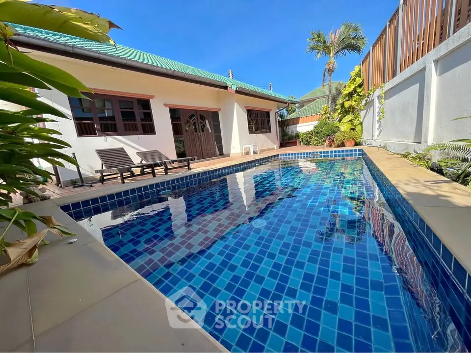 Charming villa with private pool and lush garden, perfect for relaxation and entertaining.