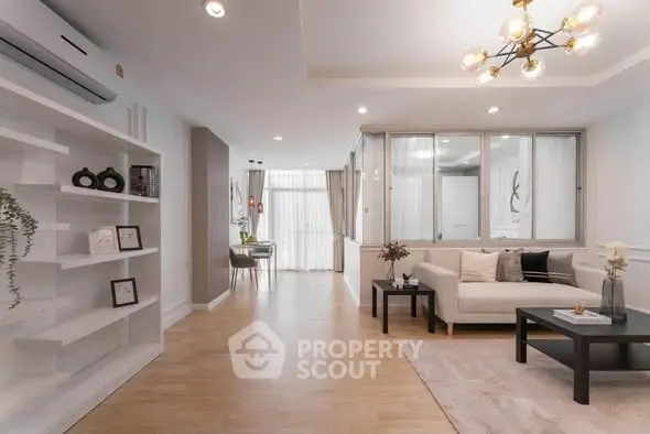 Spacious modern living room with elegant decor and natural light
