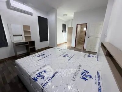 Spacious bedroom with new mattress and modern decor