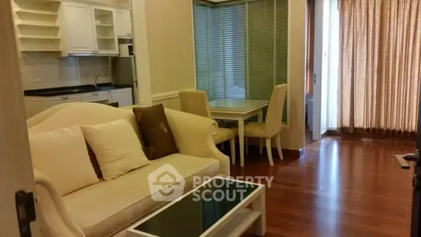 Charming living room with cozy sofa and dining area in open layout apartment