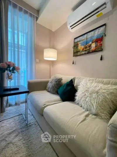 Cozy living room with plush sofa and modern decor