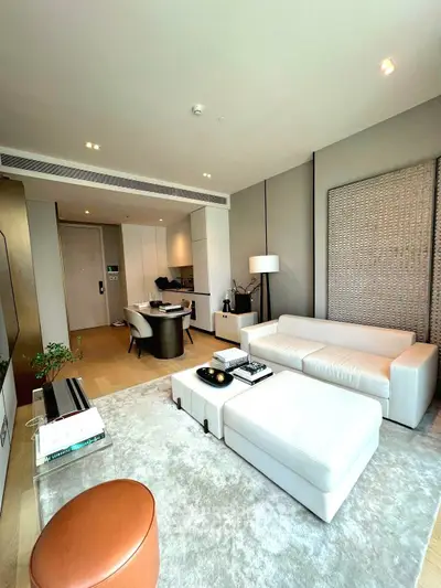 Luxurious modern living room with elegant furniture and open layout, perfect for relaxation and entertainment.