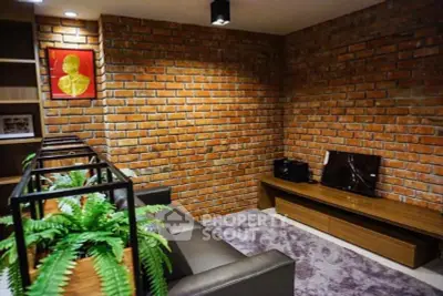 Stylish living room with exposed brick walls and modern decor