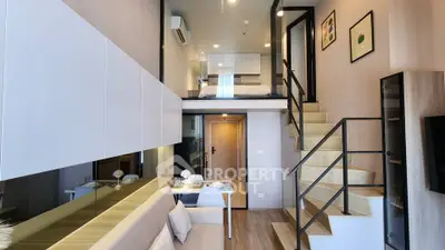 Modern loft apartment with stylish mezzanine bedroom and open living area