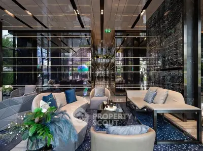 Luxurious modern living room with elegant decor and plush seating in a high-end property.