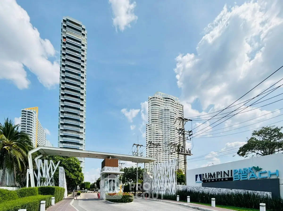 Luxurious beachfront condominium with modern architecture and lush surroundings at Lumpini Park Beach.