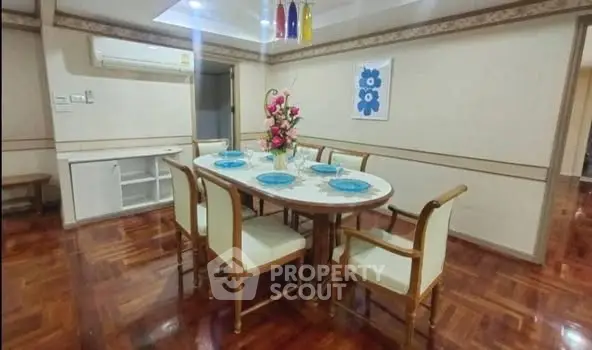 Elegant dining room with wooden flooring and stylish decor