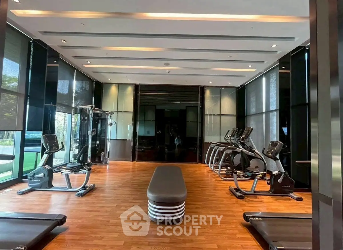 Luxurious modern gym with state-of-the-art equipment and sleek design