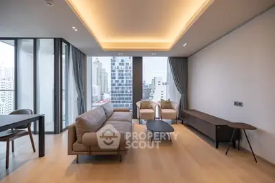 Modern living room with city view and elegant furnishings