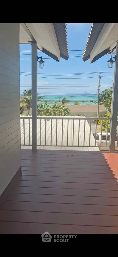 Stunning balcony with ocean view in tropical paradise home
